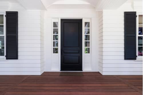 Black front door of classic style house, replacement doors in Madison
