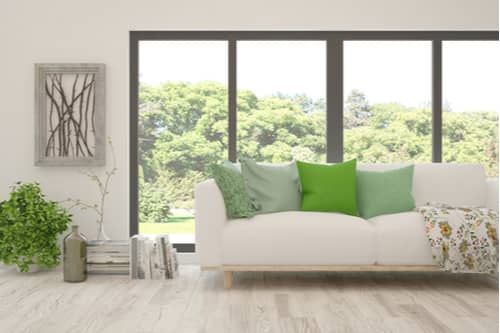 Stylish modern room white sofa windows, window replacement in Charlotte